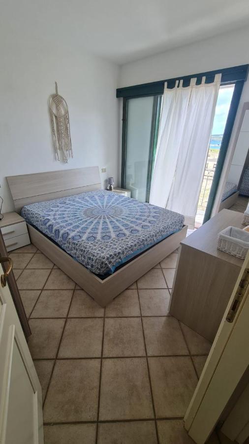 Apartamento Casa Il Pescatore Porto Pozzo Exterior foto